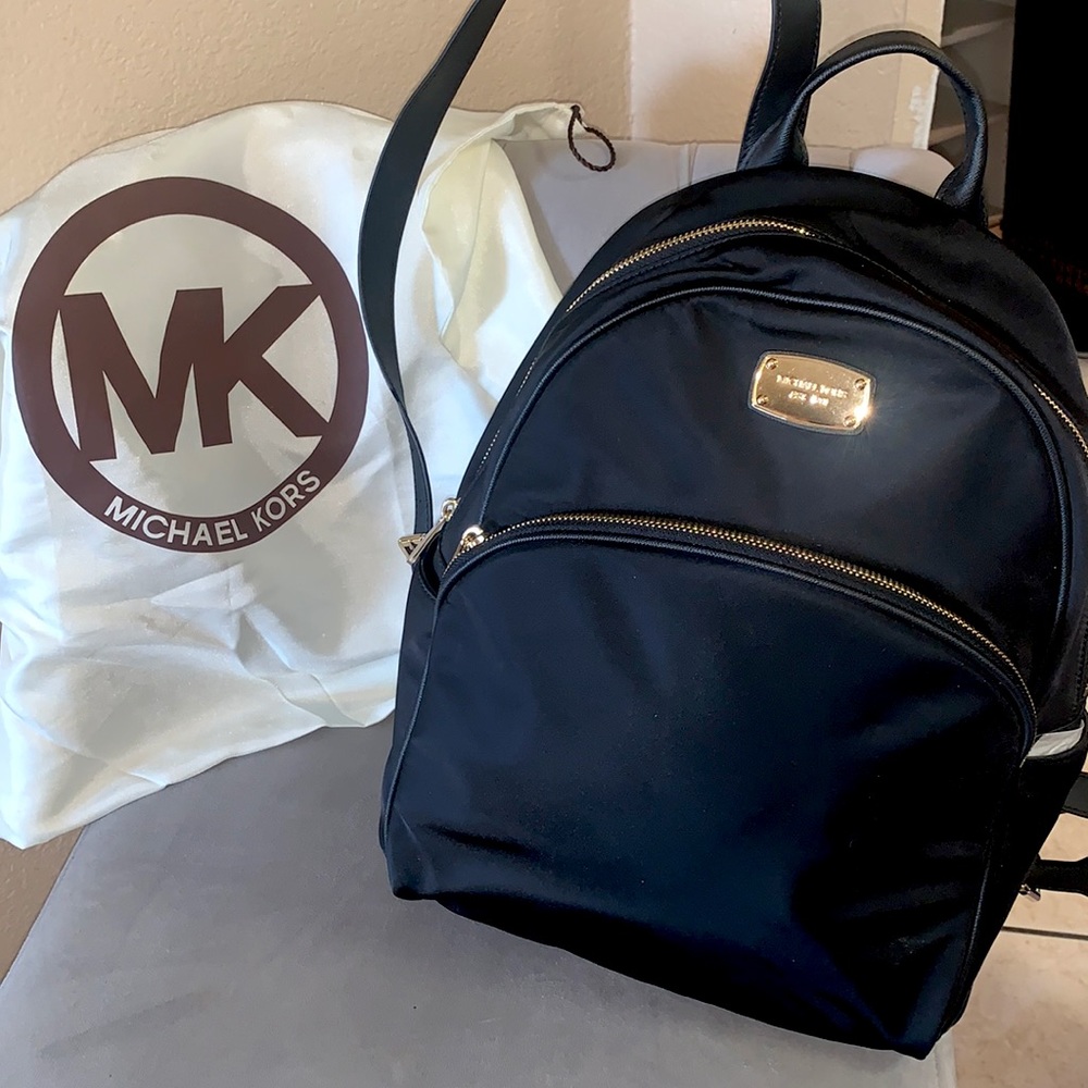 Black nylon backpack, Leather straps